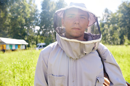Young Apiarist in Meadow
