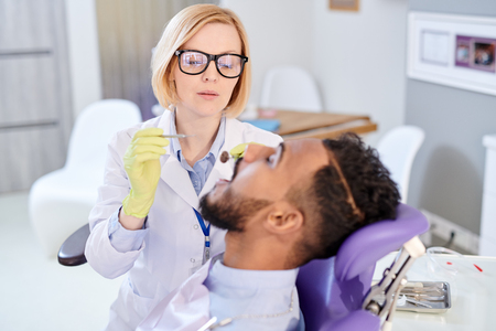 Pretty Dentist Having Appointmentの写真素材