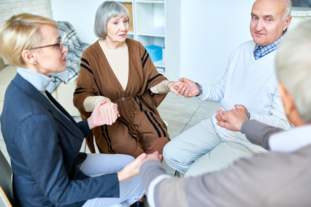 Group of senior people with consultantの写真素材