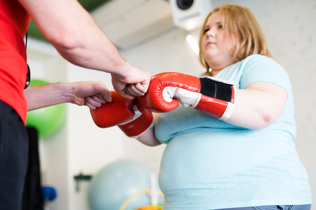 Coach Motivating Obese Womanの写真素材
