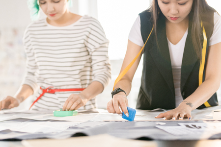 Young Women Sewing Clothesの写真素材
