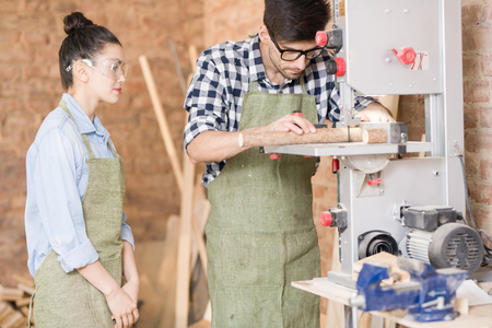 Carpenter Working with Woodの写真素材