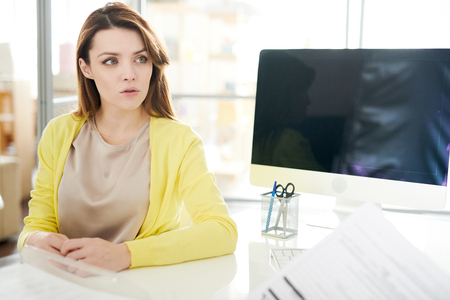 Beautiful Young Woman in Doctors Officeの写真素材