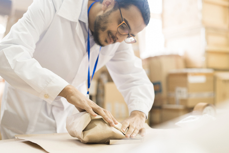 Arabian Worker at Packaging Departmentの写真素材