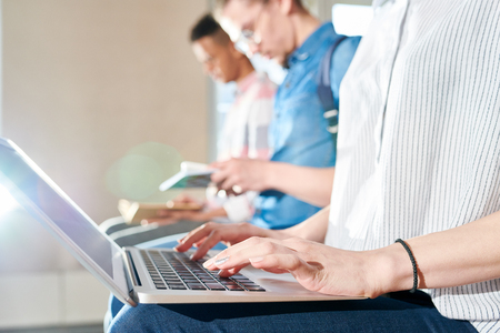 Modern student using laptopの写真素材