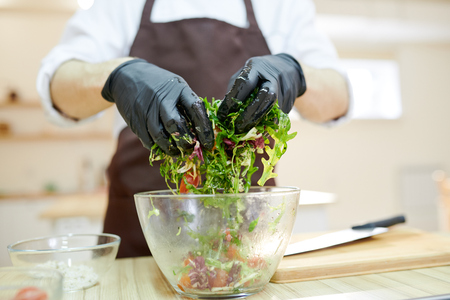 Chef Mixing Saladの写真素材