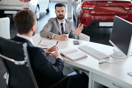 Businessman Choosing Carの写真素材