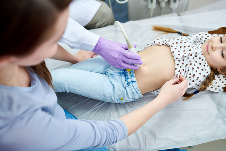 Little girl at pediatrician receptionの写真素材