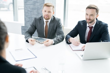 Two Entrepreneurs Negotiating with Partnerの写真素材