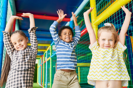 Excited Children in Play Centerの写真素材