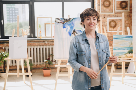 Female Artist Posing in Studioの写真素材