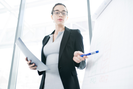 Young Businesswoman Giving Presentationの写真素材
