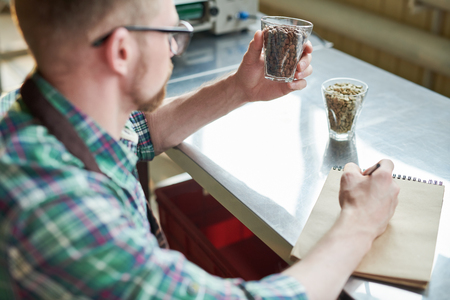 Barista Examining Coffee Roast Typesの写真素材