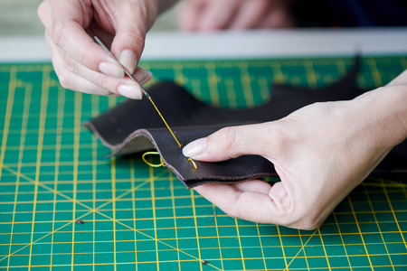 Sewing goods from leather