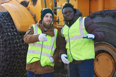 Two Mining Workers on Site Outdoors