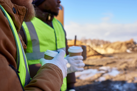 Unrecognizable Workers on Coffee Breakの写真素材