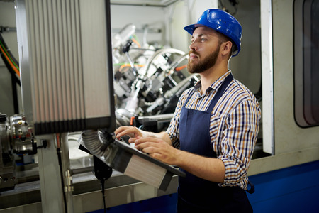 Bearded Worker using Power Units