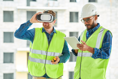 Construction Workers Using VR on Siteの写真素材