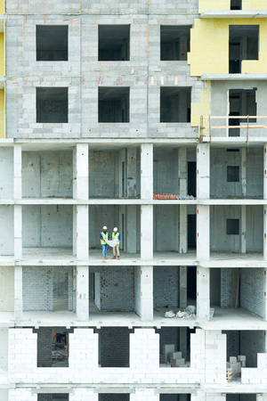 Workers in Unfinished Houseの写真素材