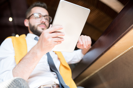 Businessman Using Tablet Low Angleの写真素材