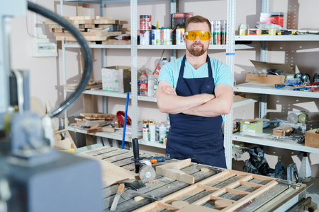 Carpenter at furniture factoryの写真素材
