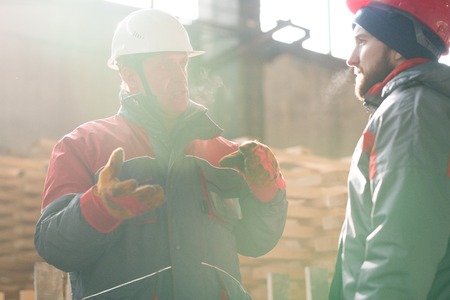 Two Workers Communicating