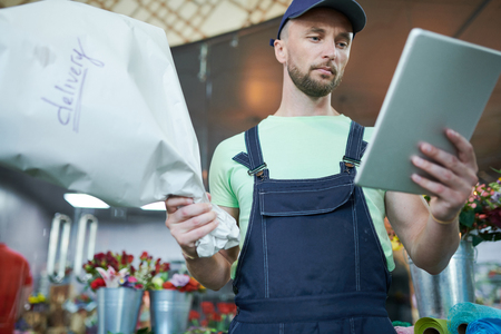 Man Delivering Flowersの写真素材