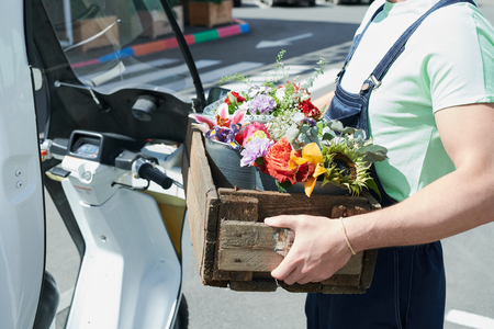 Worker with Flowersの写真素材