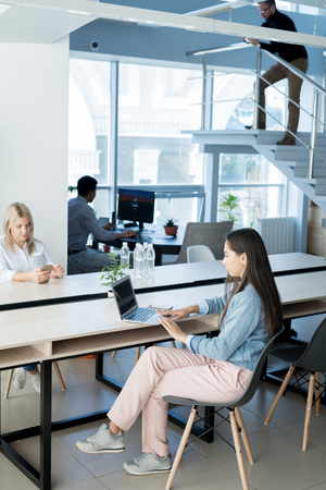 Businesswoman working at modern officeの写真素材