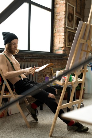 Young Artist in Studioの写真素材