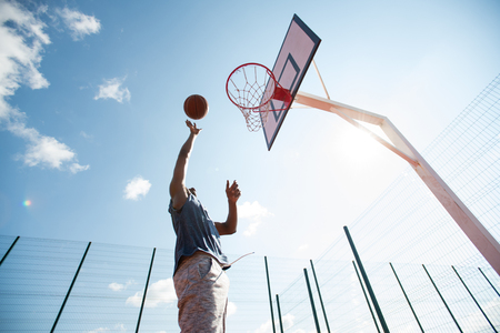 Basketball Player Jumping in Courtの写真素材