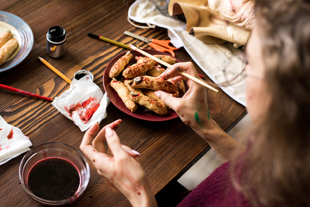 Making spooky witch finger cookies for Halloweenの写真素材