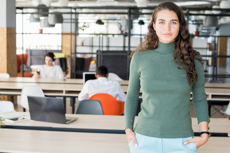 Content successful lady working in modern companyの写真素材