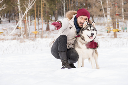 Loving Owner with Dogの写真素材