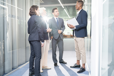 Modern African manager setting goals in front of business teamの写真素材