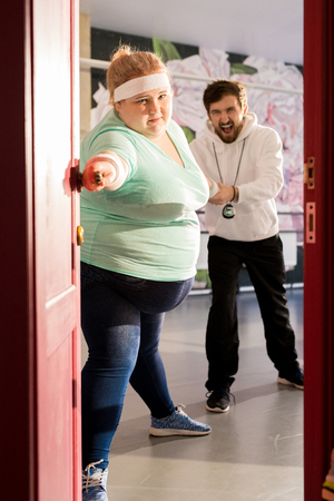 Fat Woman Escaping Trainingの写真素材