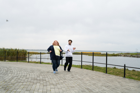 Obese Woman Running Outdoorsの写真素材