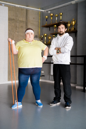 Confident Obese Woman in Trainingの写真素材