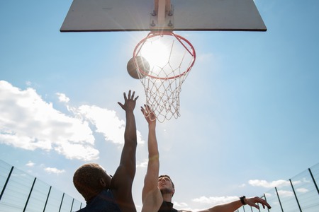 Basketball Players in Sunlightの写真素材