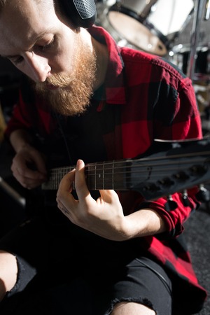 Bearded Man Playing Guitarの写真素材