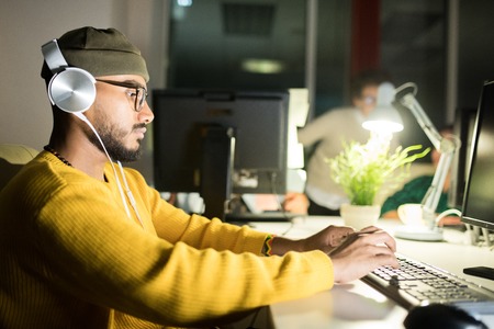 Computer Programmer Working Lateの写真素材