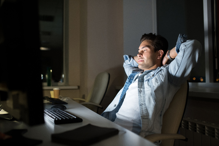 Man Resting at Workplaceの写真素材