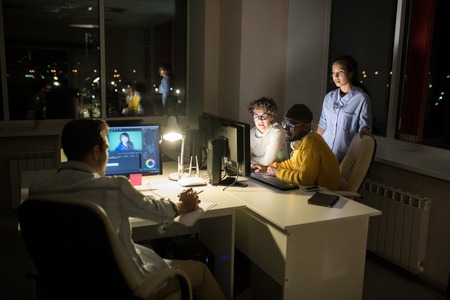 Creative People Working at Nightの写真素材