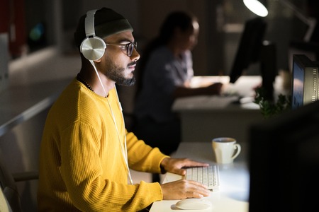 Computer Programmer Coding at Night
