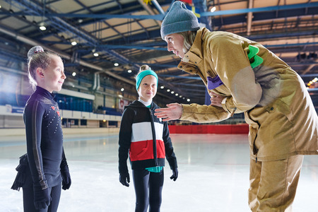 Coach Motivating Children