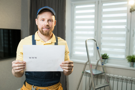 Handyman recommending his serviceの写真素材