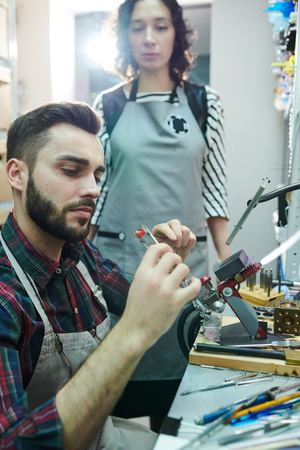 Male Artisan Doing Glassworkの写真素材