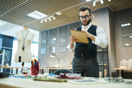 Male Designer Creating Jewelry