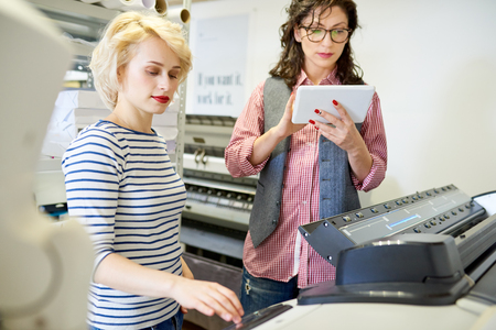 Printshop Operators Using Plotterの写真素材