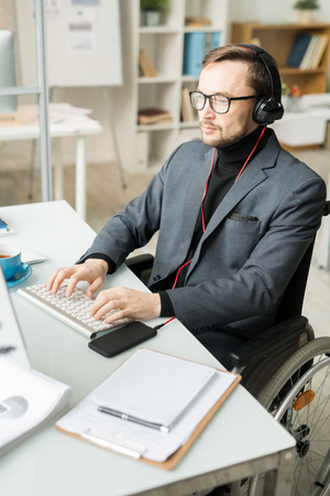 Businessman typing on computerの写真素材